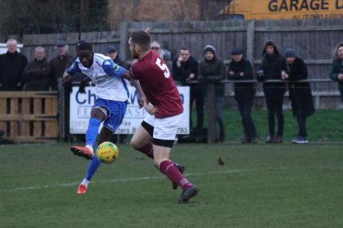 Enfields Muhammadu Faal shoots past James Buddens attempted block