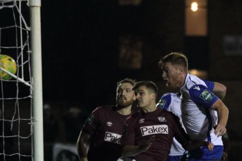Marc Weatherstone (R) heads the winning goal