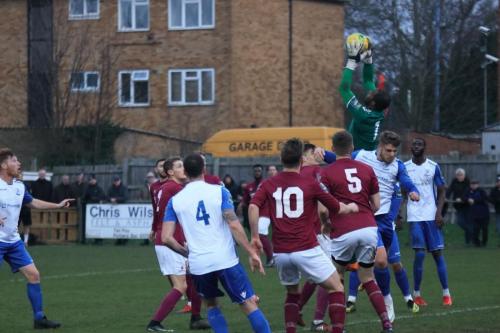 Potter Bar keeper Berkley Laurencin collects a cross
