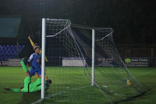 Billy Bricknell (yellow) celbrates as Taofiq Olomowewes header puts Enfield 2-0 up