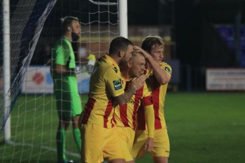 Enfield scorer Ryan Blackman celebrates with Billy Bricknell (L) and Aaron Greene