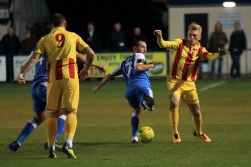 Enfields Ryan Blackman (R) challenges Adem Ramadan