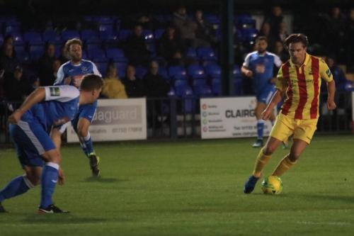 Enfields Sam Youngs runs at the defence