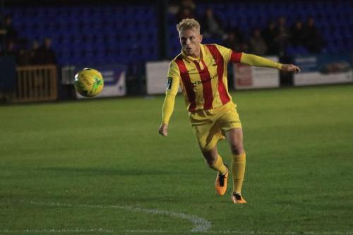Ryan Blackman takes careful aim to put Enfield 1-0 ahead