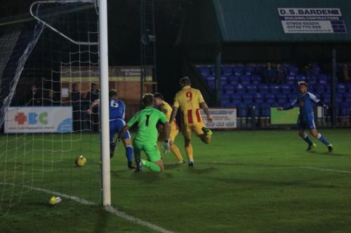 Tonbridges Arthur Lee (6) and Enfields Lewis Taaffe and Billy Bricknell scramble for the loose ball after Jon Henlys save