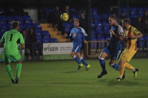 Tonbridges Arthur Lee (blue) and keeper Jon Henly and Enfields Billy Bricknell