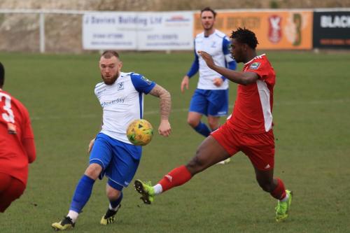 Enfields Billy Bricknell (L) and Whitehawks SinnKaye Christie