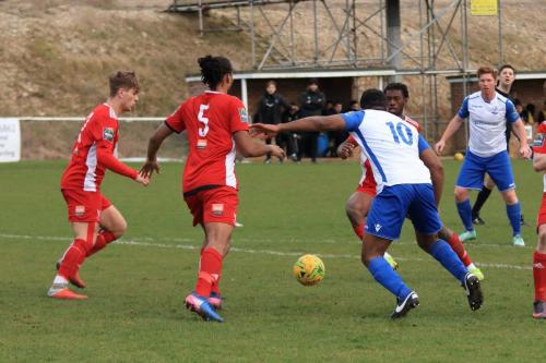 Enfields Kezie Ibe and Whitehawks Fintan Walsh (L), Yannis Ambroisine (5) and SinnKaye Christie