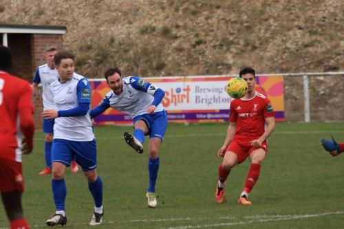 Enfields Matt Johnson curls a shot just over the bar