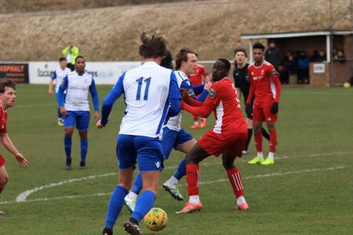 Enfields Mickey Parcell (white, R) lays the ball to Sam Youngs (11) and makes a run past Aaron Goode (3)
