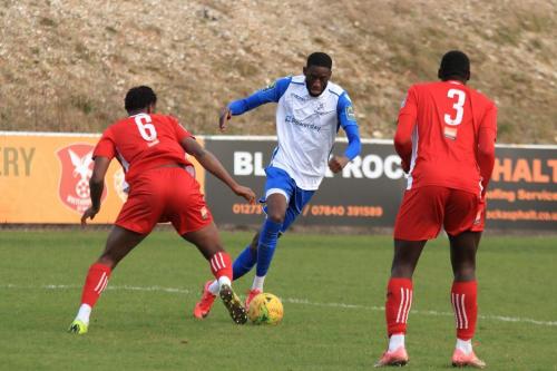 Enfields Muhammadu Faal and Whitehawks SinnKaye Christie (6) and Aaron Goode