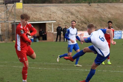 Joe Payne (R) volleys into the far corner to put Enfield 2-1 up
