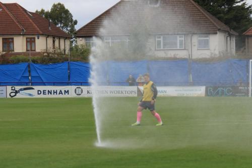 Lewis Taaffes half-time warm-up is disrupted by the sprinklers