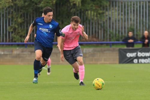 Wingates Layne Eadie (L) and Enfields Bilal Sayoud