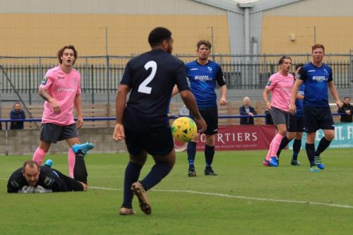 Wingates Luke Ifil (2) tidies up after a save from keeper Shane Gore