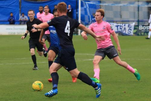 Wingates Marc Weatherstone (4) clears from Aaron Greene