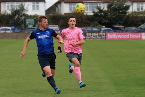 Wingates Marc Weatherstone (L) and Enfields Brandon Adams