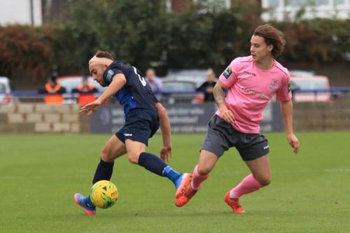 Wingates Scott Shulton (L) and Enfields Sam Chaney
