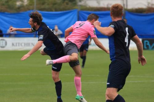 Wingates Sean Cronin (L) and Marc Weatherstone and Enfields Liam Hope