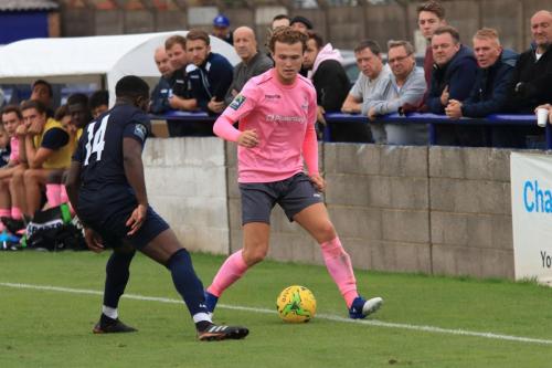 Wingates Timothy Monsheju (L) and Enfields Mickey Parcell