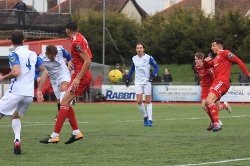 Enfields Dan Rumens (2nd L) wins a header