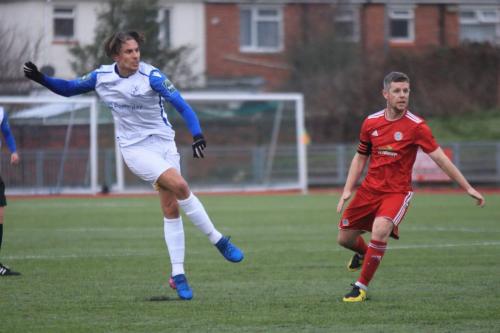 Enfields Sam Youngs (L) and Worthings Darren Budd