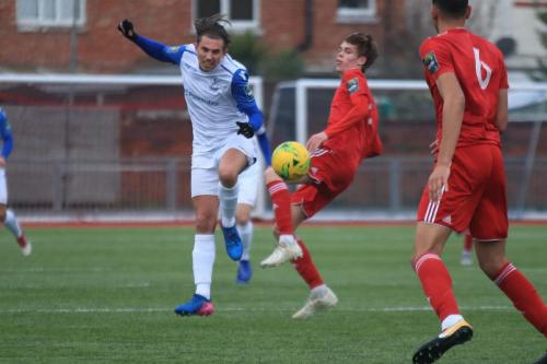 Enfields Sam Youngs (L) and Worthings Joe Clarke and Jalen Jones (R)