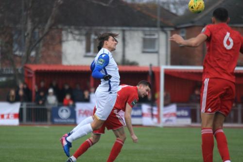 Enfields Sam Youngs (L) wins  a header against James Crane
