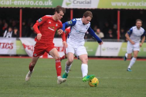 Worthings Joe Clarke (L) and Enfields Aaron Greene