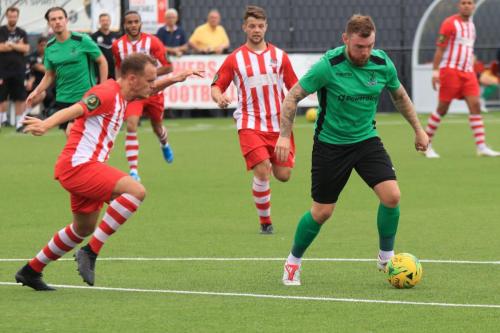 Enfields Billy Bricknell (R) runs imto the Bowers penalty area as Kenzer Lee moves to challenge