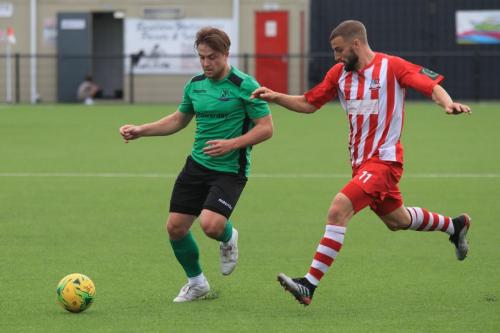 Enfields Lewis Taaffe (L) and Bowers Brad Warner