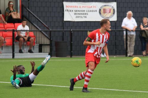 Enfields Muhammadu Faal (L) appeals for a foul by Max Cornhill