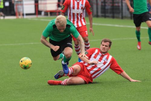 Enfields Ryan Blackmen (green) rides a ackle from Ryan Sammons