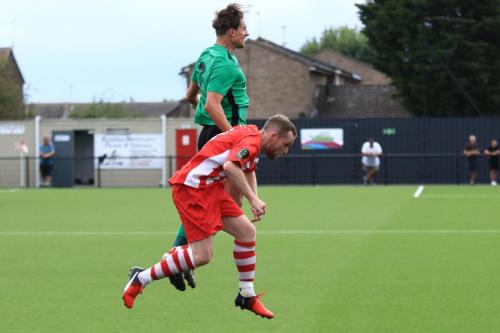 Enfields Sam youngs (green) and Bowers Tom Stephen