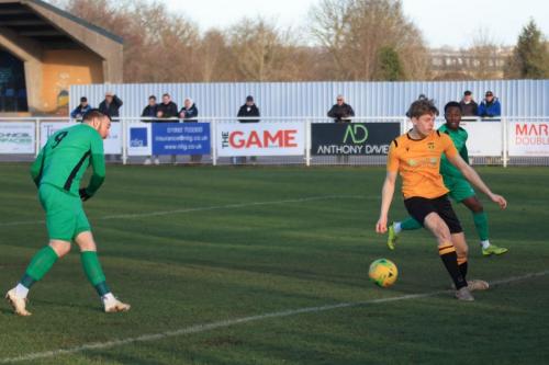 Billy Bricknell (L) gives Enfield the lead in the first minute