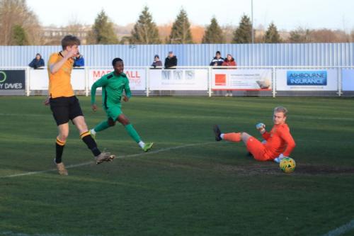 Cheshunt keeper Harry Girling is wrongfooted by Billy Bricknells shot for the opening goal  Ken Charles (green) is on hand for any rebound