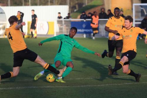 Cheshunts Adam Crowther (4) and Sean Cronin try to block Ken Charles shot