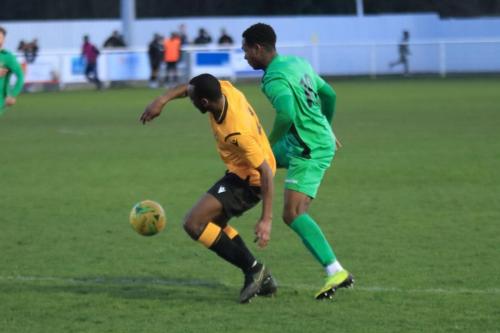 Cheshunts Ibrahim Diallo (L) and Enfields Ken Charles