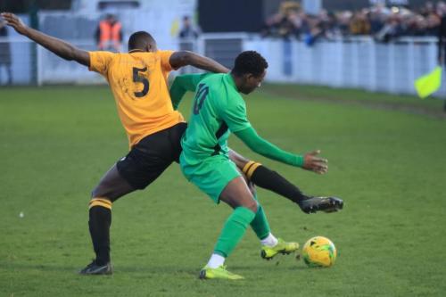 Cheshunts Mo Camara (L) and Enfields Ken Charlesx