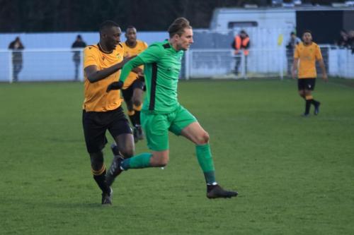 Cheshunts Mo Camara (L) and Enfields Sam Youngs