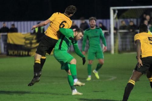 Cheshunts Sean Cronin (6) and Enfields Billy Bricknell