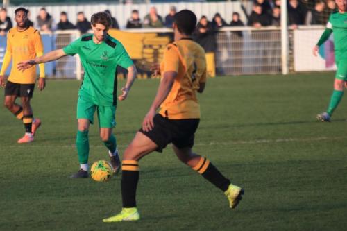 Enfields Josh Urquhart (green)