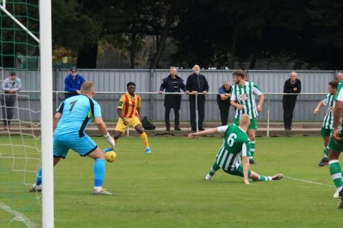 Chichesters Corey Heath (6) clears for a corner