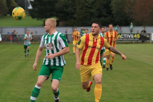 Chichesters Corey Heath (L) and Enfields Alex Read