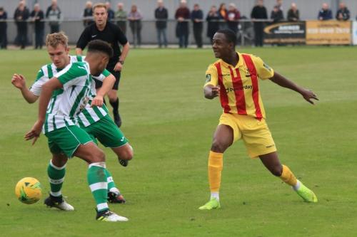 Chichesters Lloyd Rowlatt (rear) and Ryan Davidson and Enfields Ken Charles