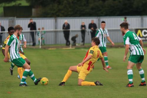 Chichesters Rob Hutchings (L) and Matt Axell and Enfields Sam Youngs