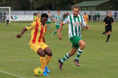 Enfields Charles Brown (L) and Chichesters Scott Jones