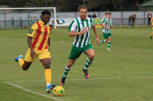 Enfields Charles Brown (L) and Chichesters Scott Jonesx