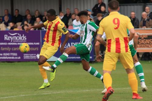Enfields Ken Charles (L) challenged by Ryan Davidson