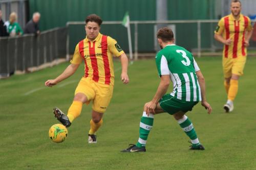 Enfields Lewis Taaffe (L) and Chichesters Rob Hutchings